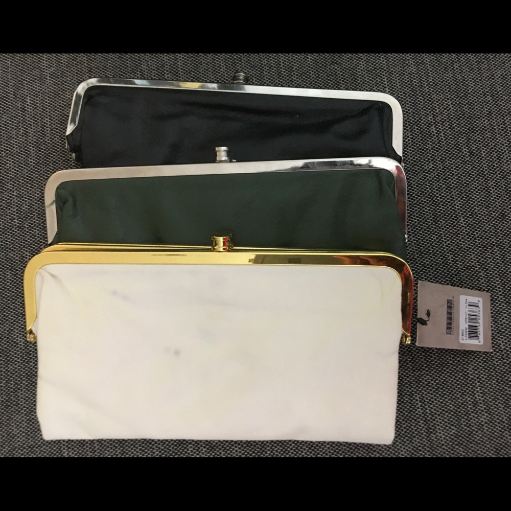 Bitten by SJP black faux leather clutch.